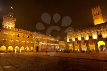 Piazza Maggiore with Accursio Palace and Palazzo del Podest at night, in Bologna, Italy