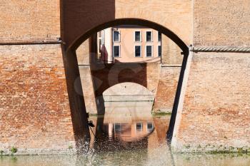 moat and bridges of Castle Estense in Ferrara, Italy