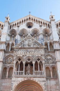 detail of facade of Ferrara Cathedral, Italy