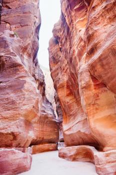 The Siq - narrow gorge to ancient city Petra, Jordan