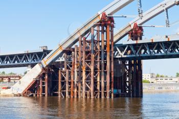 metal pier of Podilsko-Voskresenskyi Bridge on Dnieper River in Kiev, Ukraine