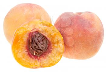 three ripe juicy peaches isolated on white background