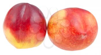 two ripe Nectarines close up isolated on white background