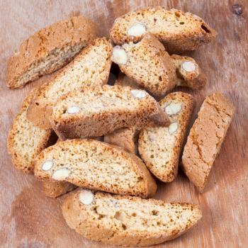 italian almond cantuccini on wooden table close up