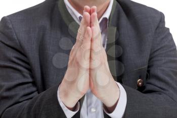 front view of businessman praying hands - hand gesture isolated on white background