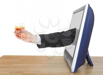 whiskey with ice glass in businessman hand leans out TV screen isolated on white background