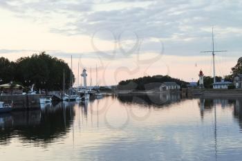 yacht mooring in Honfleur town, France in summer evening