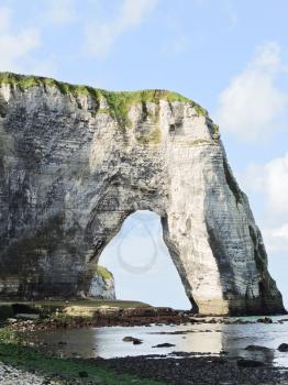 natural arch cliff on english channel beach of Etretat cote d'albatre, France