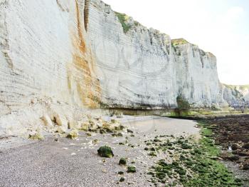 pebble beach and cliff on english channel Etretat cote d'albatre, France