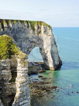 view of cliff with arch on english channel coast of Etretat cote d'albatre, France