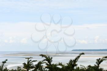 view of tidal bay of English channel at low tide from mont saint-michel abbey, Normandy