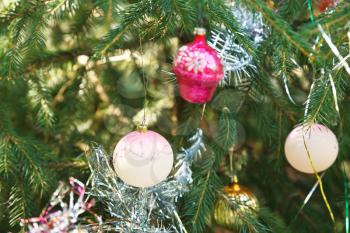white balls and pink house christmas tree vintage decoration close up