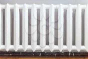 cast-iron radiator of water heating in home