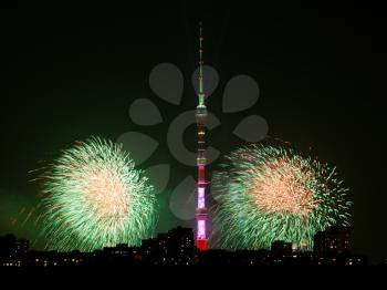 Night scene of Moscow city with Ostankino TV Tower and fireworks