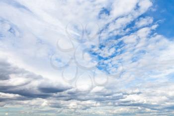 low cumuli clouds in blue sky in summer day