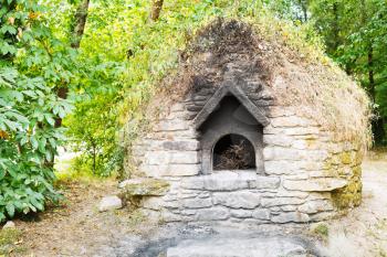 old outdoor stone oven in village de Breca, Briere Regional Natural Park, France