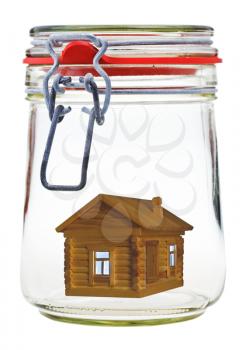 new timber house in closed glass jar