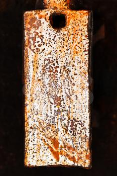 rust stains on the polished metal surface of old anvil