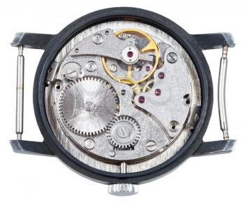mechanic clockwork of old wristwatch isolated on white background