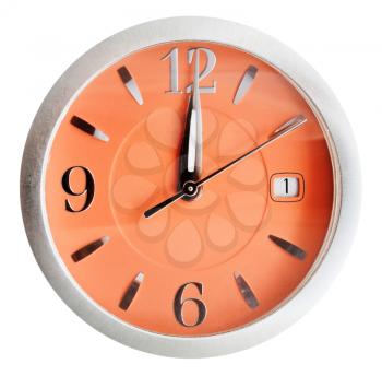 twelve o'clock on orange dial isolated on white background
