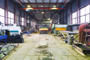 interior of mechanical workshop with metal lathes and machines