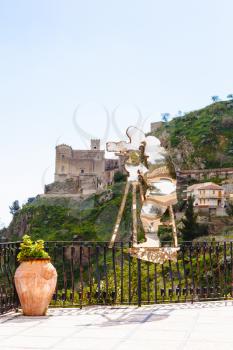 SAVOCA, ITALY - APRIL 4, 2015: Statue of Francis Ford Coppola created by Nino Ucchino - a local artist. The town Savoca was location for scenes set in Corleone of Francis Ford Coppola's The Godfather.