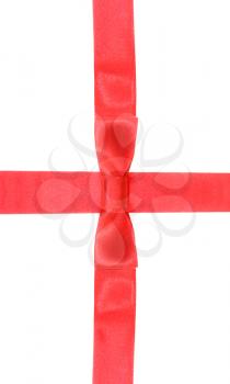 intersection of red ribbon and red satin band with bow isolated on white background