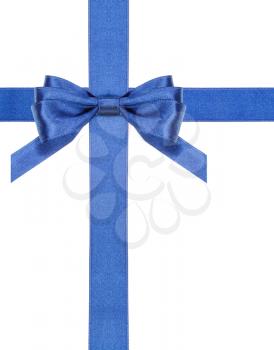 one blue satin bow in upper left corner and two intersecting ribbons isolated on vertical white background