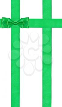 one double green bow knot on three vertical satin ribbons isolated on white background