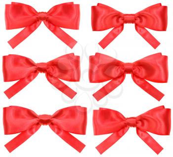 set of red satin bows isolated on white background