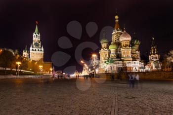 Spasskaya tower of Kremlin and cathedral on Vasilevsky Descent of Red Square in Moscow in night