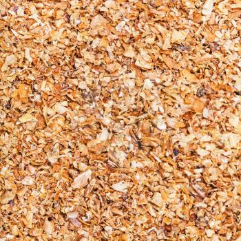 square food background - milled natural grass bran close up