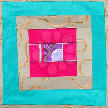 textile background - square decor of patchwork cloth