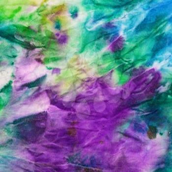 textile background - abstract hand painted green, blue and lilac nodosa batik