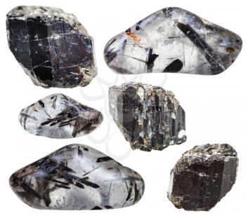 set of natural mineral stones - specimens of schorl (black tourmaline) in crystals and tumbled quarz gemstones and rocks isolated on white background