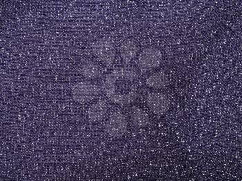 textile background - dark violet silk fabric with chiffon weave pattern of threads close up
