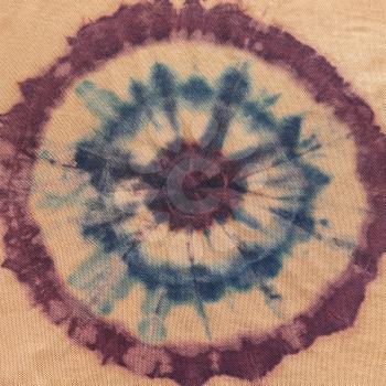 blue and brown concentric circles on silk nodular batik