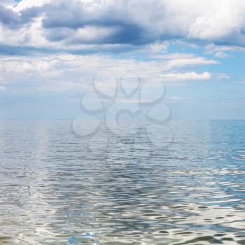 square waterscape with blue sky and calm water of Sea of Azov, Temryuk bay, Golubitskaya resort, Taman peninsula, Kuban, Russia