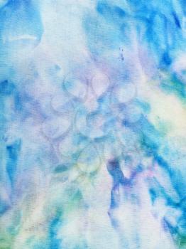 textile background - abstract blue and yellow painted silk batik