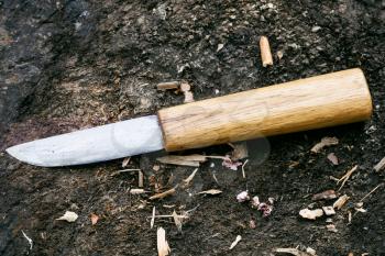 traditional hand made Yakut knife lying on ground