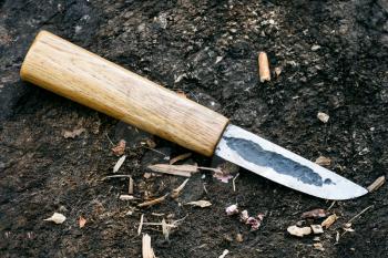 handmade Yakut knife Batu lying on ground