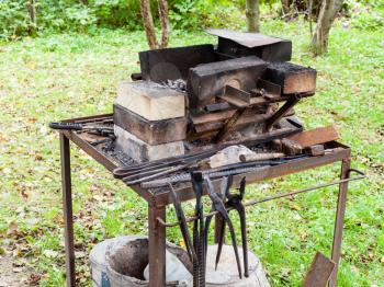 forge of country outdoor blacksmith on backyard