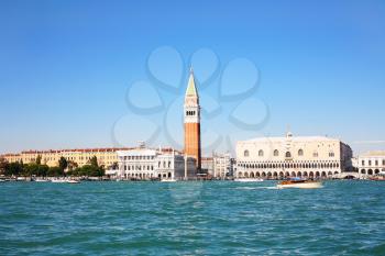 travel to Italy - view of Doge's Palace (Palazzo Ducale) and campanile from San Marco basin in Venice.