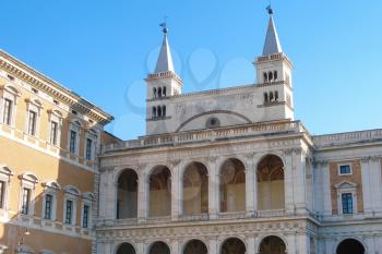 travel to Italy - the Loggia delle Benedizioni of transept facade of S. Giovanni in Laterano, bell towers and the Lateran Palace in Rome city