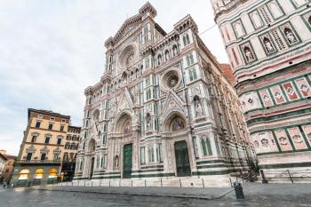 travel to Italy - Florence Duomo Cathedral (Cattedrale Santa Maria del Fiore, Duomo di Firenze, Cathedral of Saint Mary of the Flowers) and Giotto's Campanile on Piazza San Giovanni in morning