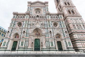 travel to Italy - front view of Florence Duomo Cathedral (Cattedrale Santa Maria del Fiore, Cathedral of Saint Mary of the Flowers) and Giotto's Campanile on Piazza San Giovanni in morning