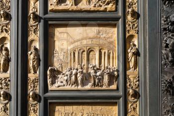 travel to Italy - panel of outdoor East doors of Baptistery (Battistero di San Giovanni, Baptistery of Saint John), the doors are copy of Gates of Paradise made by Lorenzo Ghiberti in Florence city