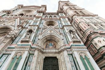 travel to Italy - facade of Florence Duomo Cathedral (Cattedrale Santa Maria del Fiore, Duomo di Firenze, Cathedral of Saint Mary of the Flowers) and Giotto's Campanile in morning