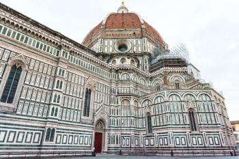 travel to Italy - view of Florence Duomo Cathedral (Cattedrale Santa Maria del Fiore, Duomo di Firenze, Cathedral of Saint Mary of the Flowers) from Piazza del Duomo in Florence city in morning