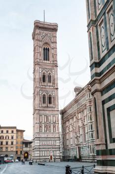 travel to Italy - view of Giotto's Campanile from Piazza del Duomo in Florence city in morning